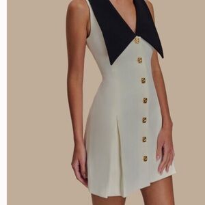 Elegant Cream Dress with Black Collar